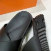 Hermès Cross Leather Slide